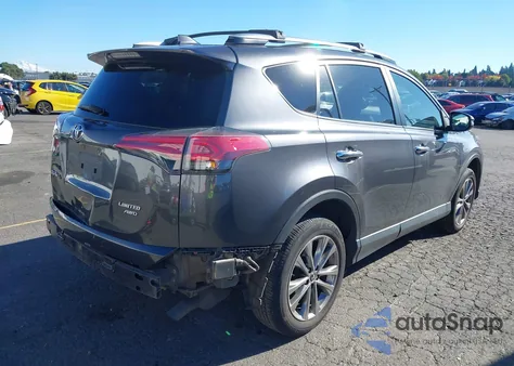 2018 Toyota Rav4 Limited z USA, uszkodzony, nr VIN JTMDFREV4JJ252211